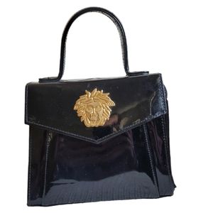 Reproduction of Paloma Picasso patent leather handbag
